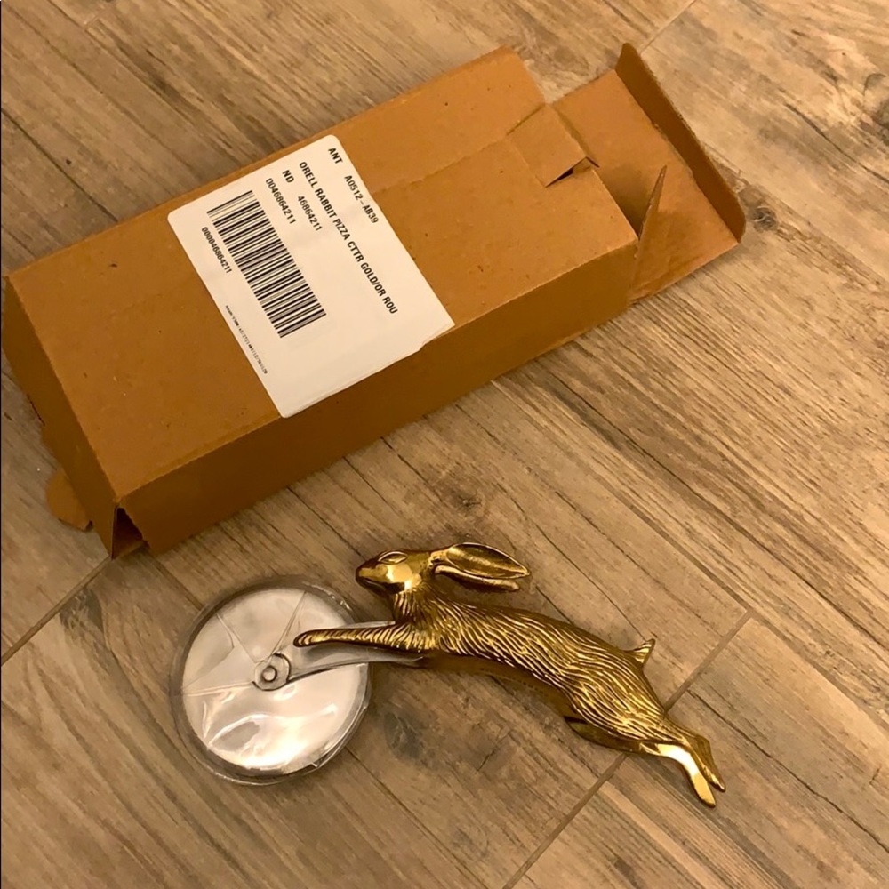Anthropologie golden rabbit pizza cutter